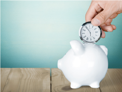 Putting a small clock in a penny bank, illustrating cost and time effectiveness of online invitations.